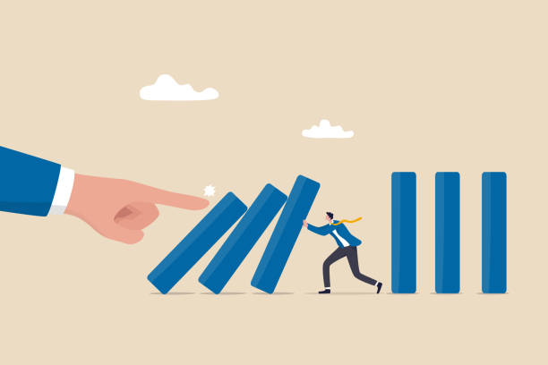 Risk management, control danger, lost or damage from crisis or accident, management and investment strategy, assessment level concept, businessman stop risk of domino effect from threats and disaster.